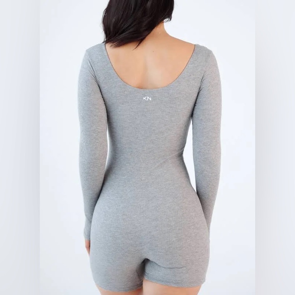 NWT in bag. XS. Gray Long Sleeve Knit Romper. Built in bra, Klassy Network